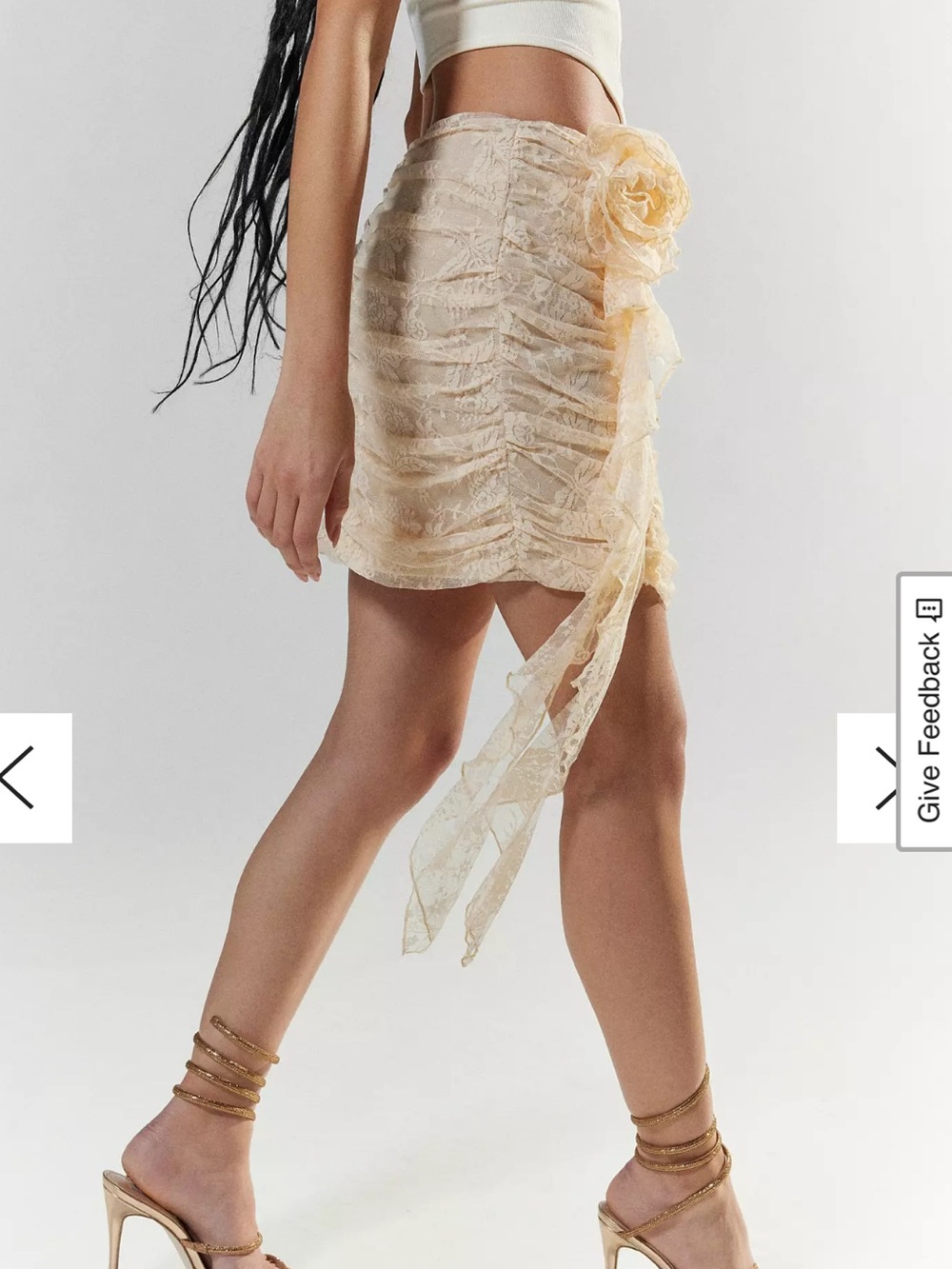 Rare London ruched mini skirt features a prominent